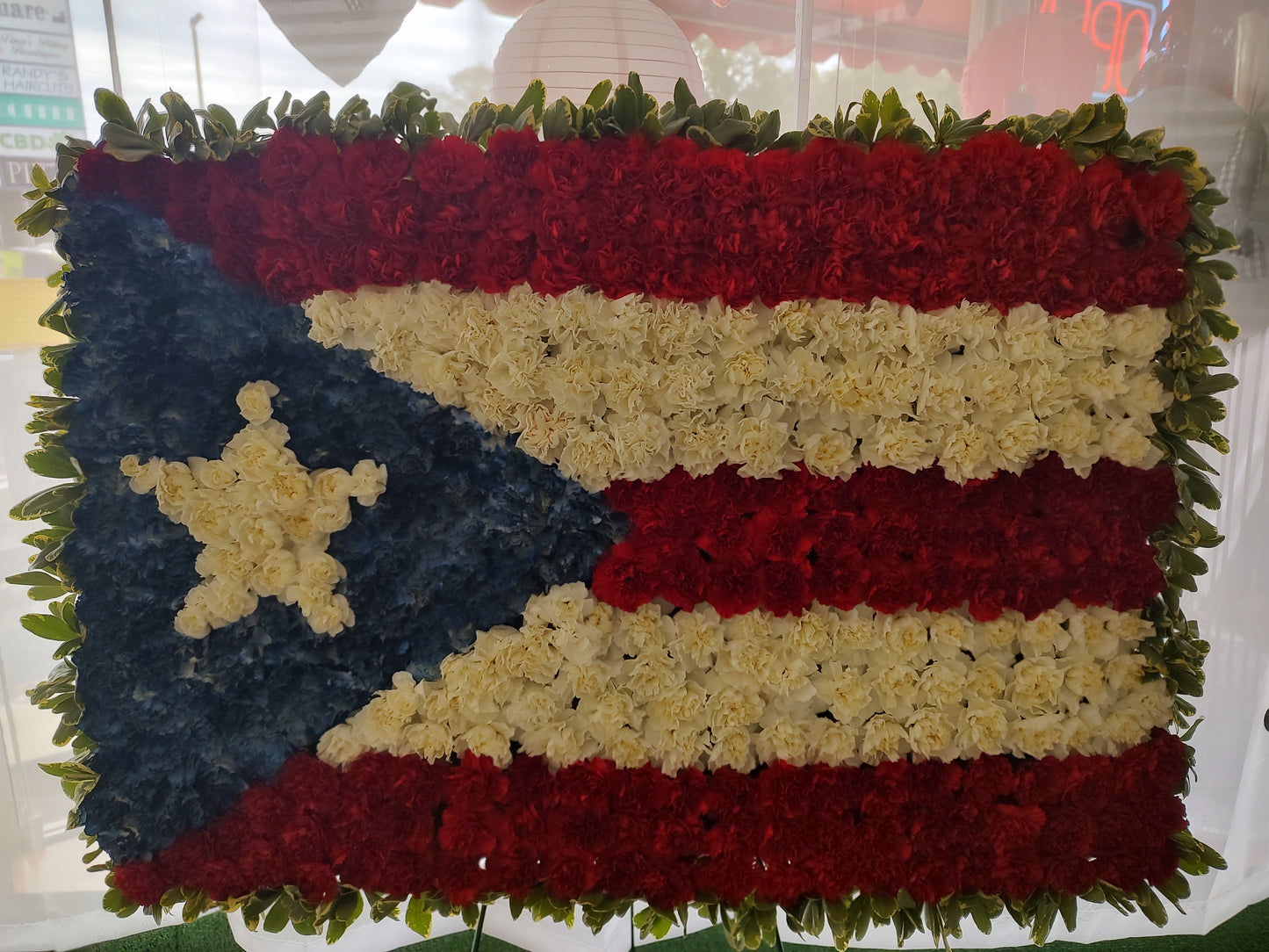 must order 2 day prior to service.Puerto Rican flag - made with fresh florals