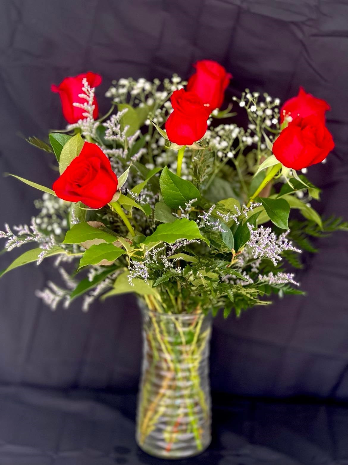 A Half Dozen Red Roses