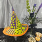 Local made witches hat with budvase of flowers
